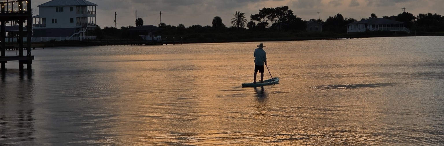 Sunset paddleboarding Galveston travel guide