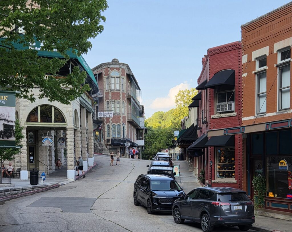 Downtown Eureka Springs featuring historic architecture, shops, and winding streets.
