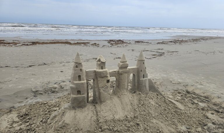 Sandy beach along the Galveston coastline.