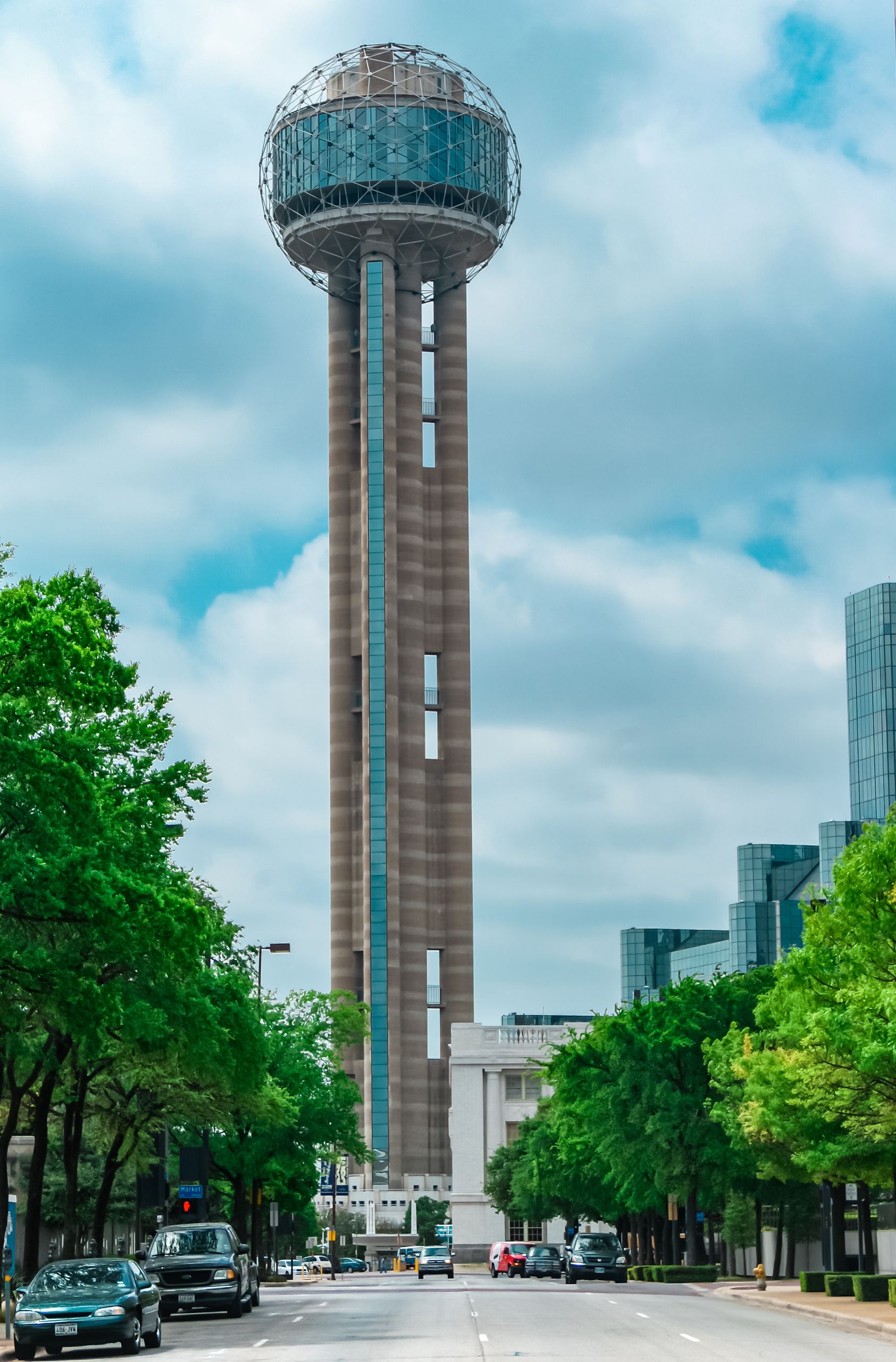 Iconic Reunion Tower against a cloudy sky in Dallas, Texas.
