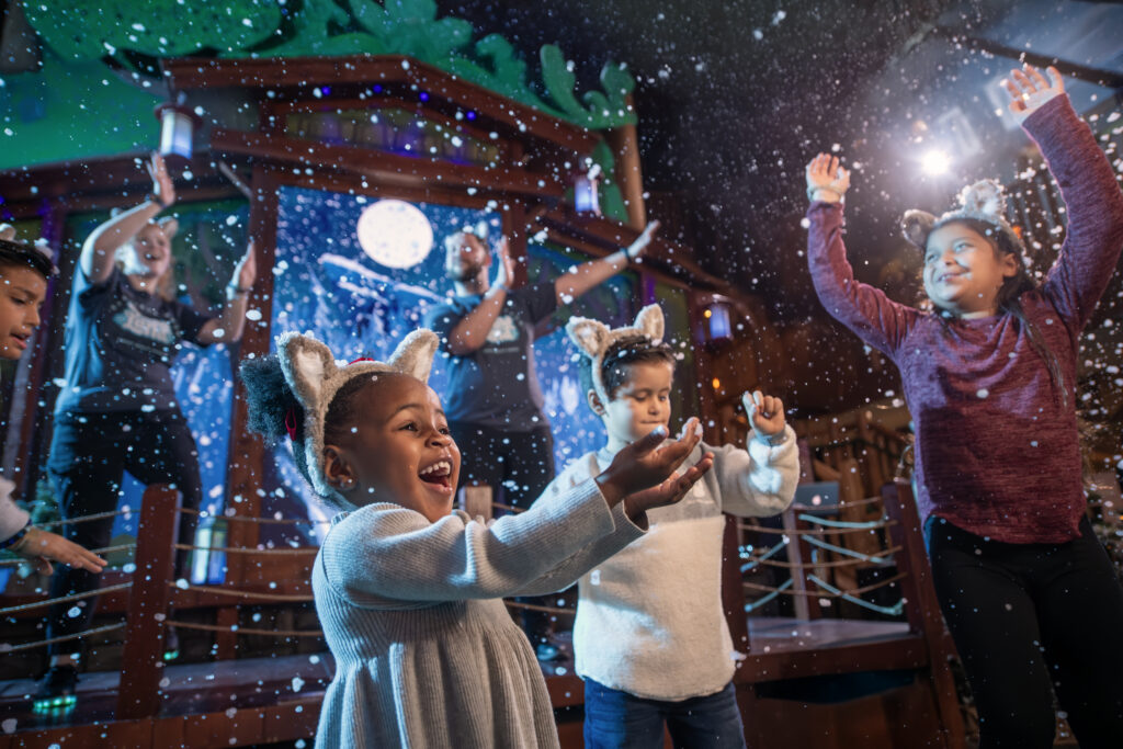 Kids enjoying Snowland at Great Wolf Lodge during the Christmas season