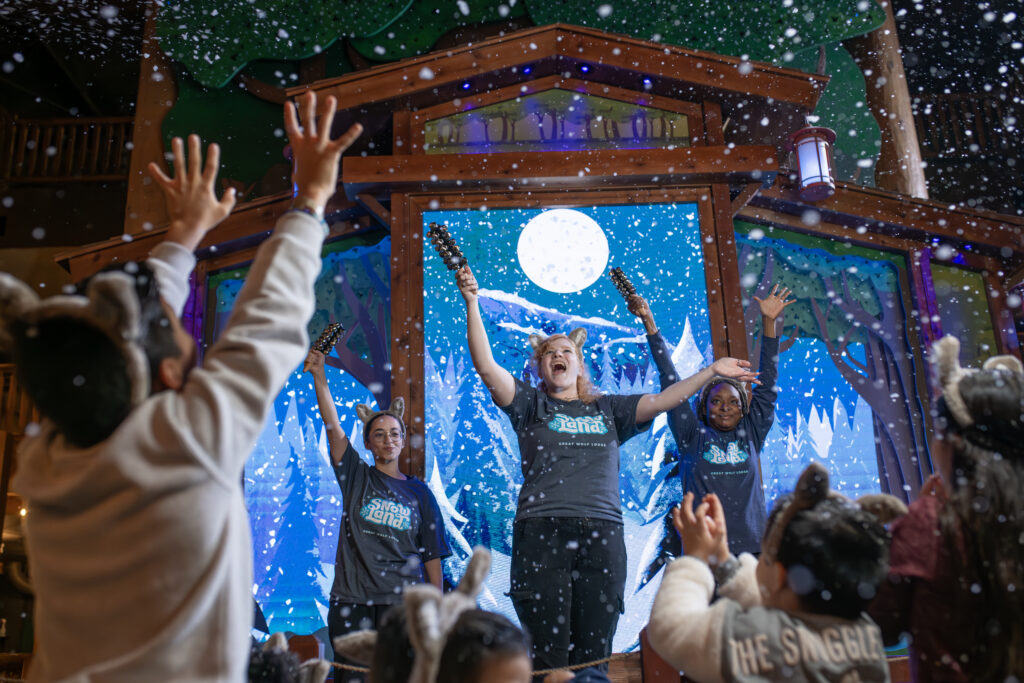 Snowland staff leading the Snowfall Celebration at Great Wolf Lodge